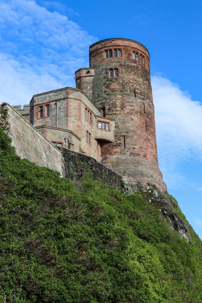 The iconic clock tower at Bamburgh Castle in Northumberland